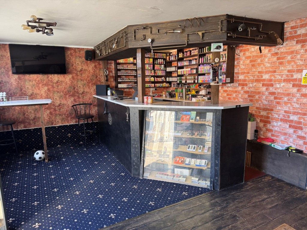 Lot: 63 - THREE STOREY FREEHOLD TOWN CENTRE COMMERCIAL INVESTMENT - Reverse Angle of the Ground Floor